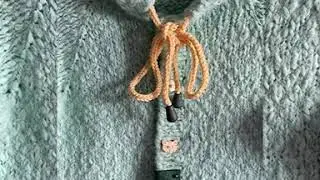 Фактурный комбинезон спицами