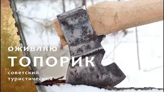 An axe made of iron and a stick against a parang.