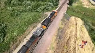 Epic FPV Drone Chase: Adrenaline-Fueled Pursuit of a BNSF Freight Train Along the River Coast!