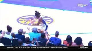 Old Man Fan Catches Erica Wheeler As She Saves Ball Crashing Into The Stands! 