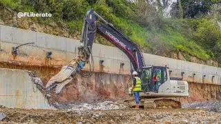 Demolição de muro com pulverizador hidráulico na estação de Mortágua
