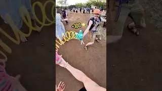 Slinking a car and 3 juggling clubs 🎳 #slinkytricks at Texas Eclipse - music by Balkan Bump