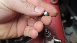 Installing a pressure gauge to measure turbo boost on a Kamaz truck.