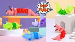 Антистресс игрушка динозавр Pop tubes
