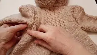 I knit and unravel//the coat for my granddaughter is ready.