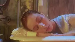 mixkit worried woman in a victorian bathub