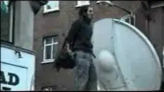 russell brand on top of a van