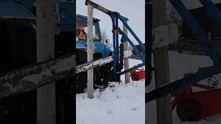 Простой механизм для быстросъёма навесного погрузчика на тракторе