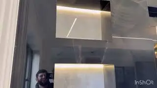 A Chechen works with tiles in England.
