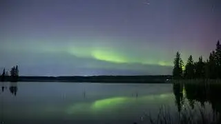 Dazzling Aurora Reflects in Still Lake