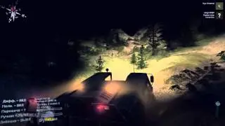 Trucks MAZ 7310 drive at night on the road spin tires first person