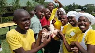 GRADE 8 LEARNERS DRESSING POULTRY CARCASS.  AGRICULTURE AND NUTRITION