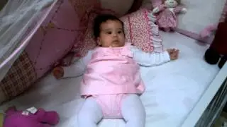Isabela watching Galinha Pintadinha