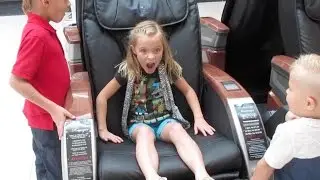 KIDS HILARIOUS REACTION TO ELECTRIC FULL BODY MASSAGE CHAIRS | DYCHES FAM