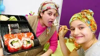 Reyhan abla ve rus torun Daria sushi yiyorlar. Komik video