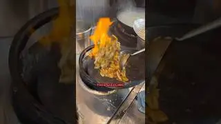 Watch these Shanghai rice cakes come to life in a sizzling wok! #chinesecuisine #WokMagic