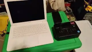 My photobooth setup. Laptop + sparkbooth app + webcam + canon cp selphy printer voila! Under $200!