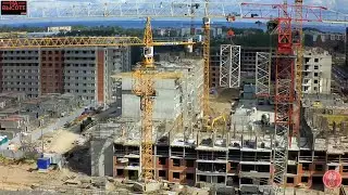 At height. How a crane lifts itself. Raising a tower crane by 20 meters.