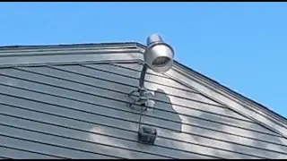 Installing a 70-Watts HPS Street Light on the South Side Peak