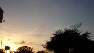 Crazy Horseshoe Shaped Loner Cloud in Sky After Heavy Day of Spraying!! Strange...