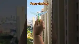 #shorts Throw a paper airplane that flies far and high #paper airplane #paper plane #paper aeroplane