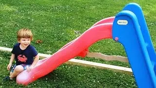 Babies Playing on Slides