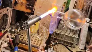 Glassblowing a round bottom borosilicate glass flask into a plasma orb blank vessel