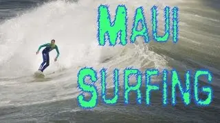 Surfing on the coast Maui,Hawaii
