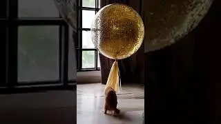 Kittens and a golden balloon