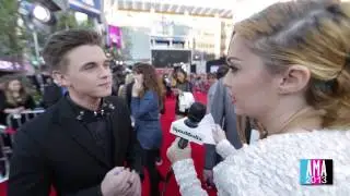 Jesse McCartney Talks With Brandi Cyrus At The AMAs