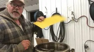 Dipping plastic foundation in wax.
