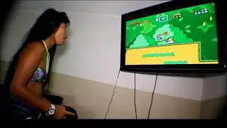 Heather Deep Thai Teen playing super mario brothers video game