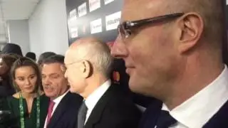 Рустем Хамитов, Рене Фазель и Дмитрий Чернышенко в микст-зоне