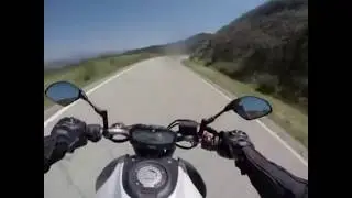motorcycle hits truck.