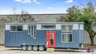 36' Homesteader Deluxe Tiny Home on Wheels with a large built-in Dog Kennel