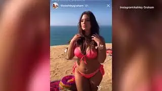 Ashley Graham flaunts multiple bikinis on a beach with camels