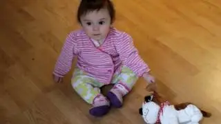 Vienna meets her new robot dog toy
