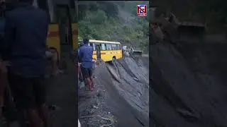 SCARY DRAMATIC VISUALS | SCHOOL BUS ON THE VERGE OF TOPPLING AS LANDSLIDE HITS NH 29 IN NAGALAND
