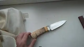 Рукоять из зуба мамонта.