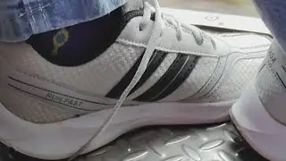 Beautiful new sneakers candid step on hand trample. (CFT - 13)