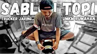 Sablon DTF di Topi Trucker Jaring