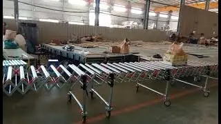 Steel gravity skate wheel telescopic roller conveyor
