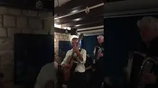 funny musician in a restaurant.  Paris.