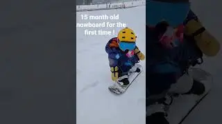 15 months old baby  snowboard for the first time !