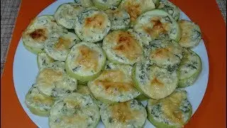 Ещё один способ приготовить кабачки - в духовке с сыром и сметаной.