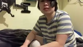 Chubby femboy rests with cat