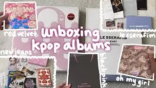 unboxing FIVE kpop albums! ft. red velvet, oh my girl, blackpink, new jeans, le sserafim