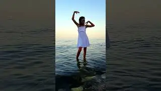 Child model photo shoot at sea.  young model 