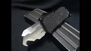 OTF  (OUT THE FRONT) Gut Hook Knife.,