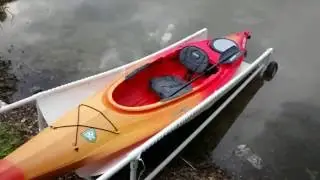 Stay dry loading a kayak in or out of the water with a pvc pipe slide ramp